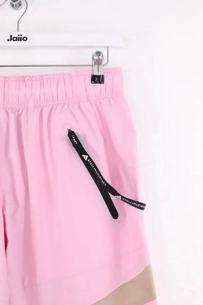Pantalon de sport Adidas Rose en Synthétique