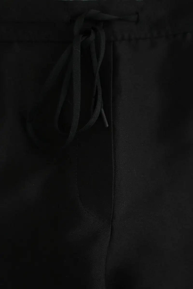 Pantalon Sandro Noir en Polyester