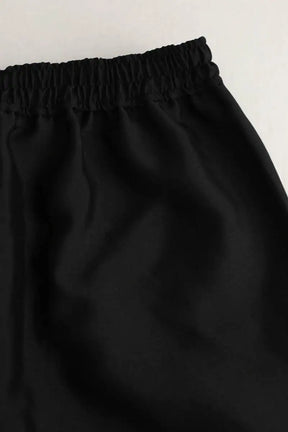 Pantalon Sandro Noir en Polyester