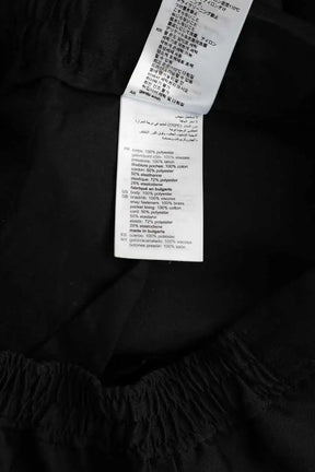 Pantalon Sandro Noir en Polyester