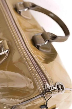 Sac à main Longchamp Paris boston coloris taupe imprimé sigle longchamps monochrome Kaki en Cuir verni