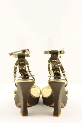 Talons Dior Doré en Cuir