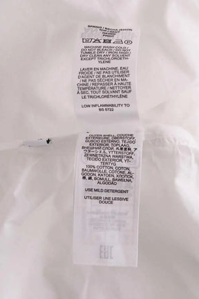 Top asymétrique Essentiel Antwerp Blanc en Coton