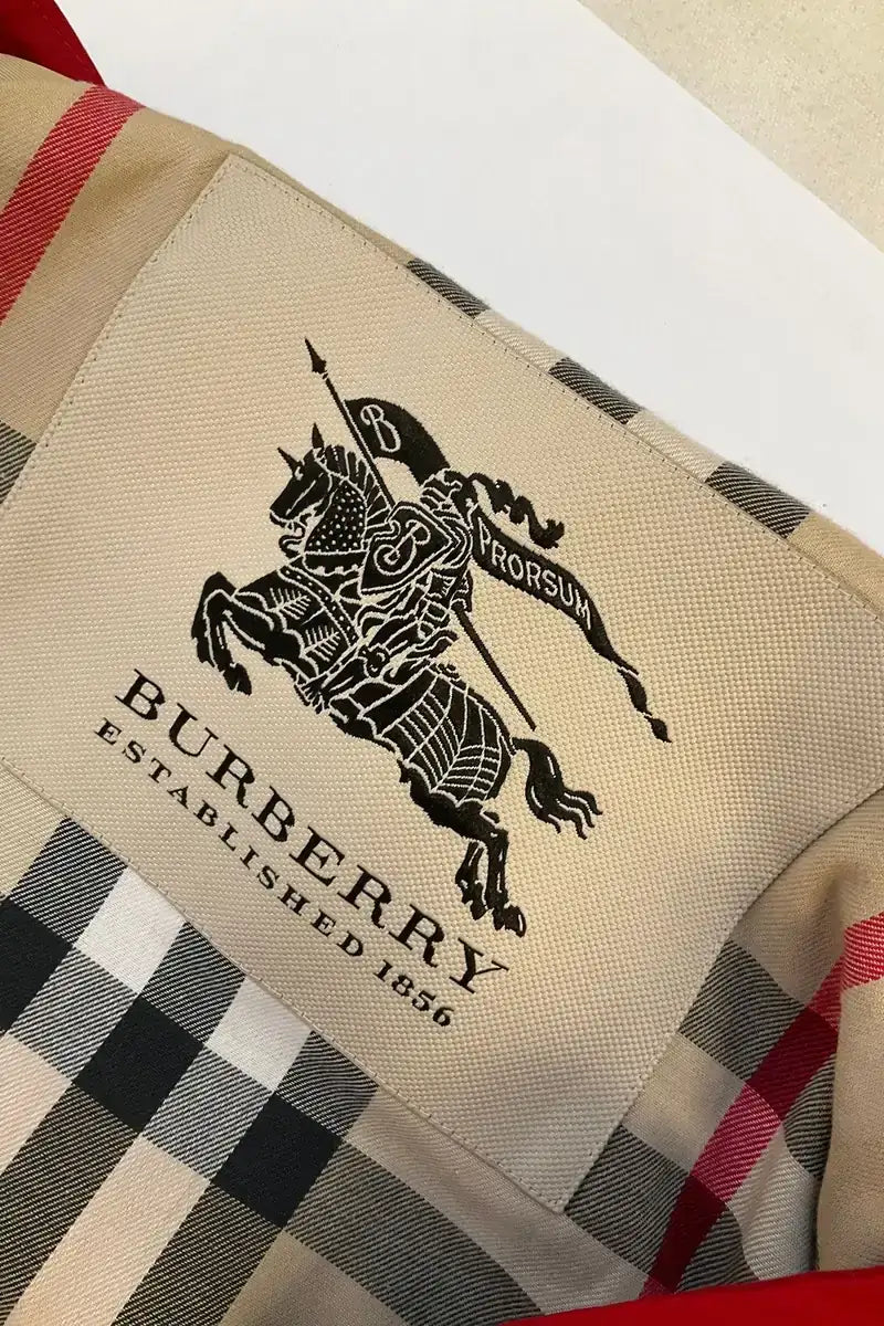 Trench-coat Burberry Rouge en Coton