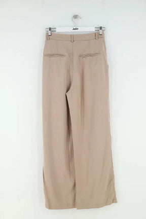 Pantalon large Reformation Beige en Synthétique