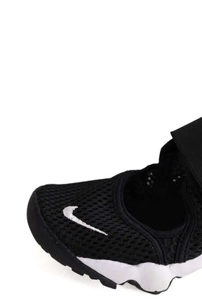 Baskets Nike Noir en Tissu